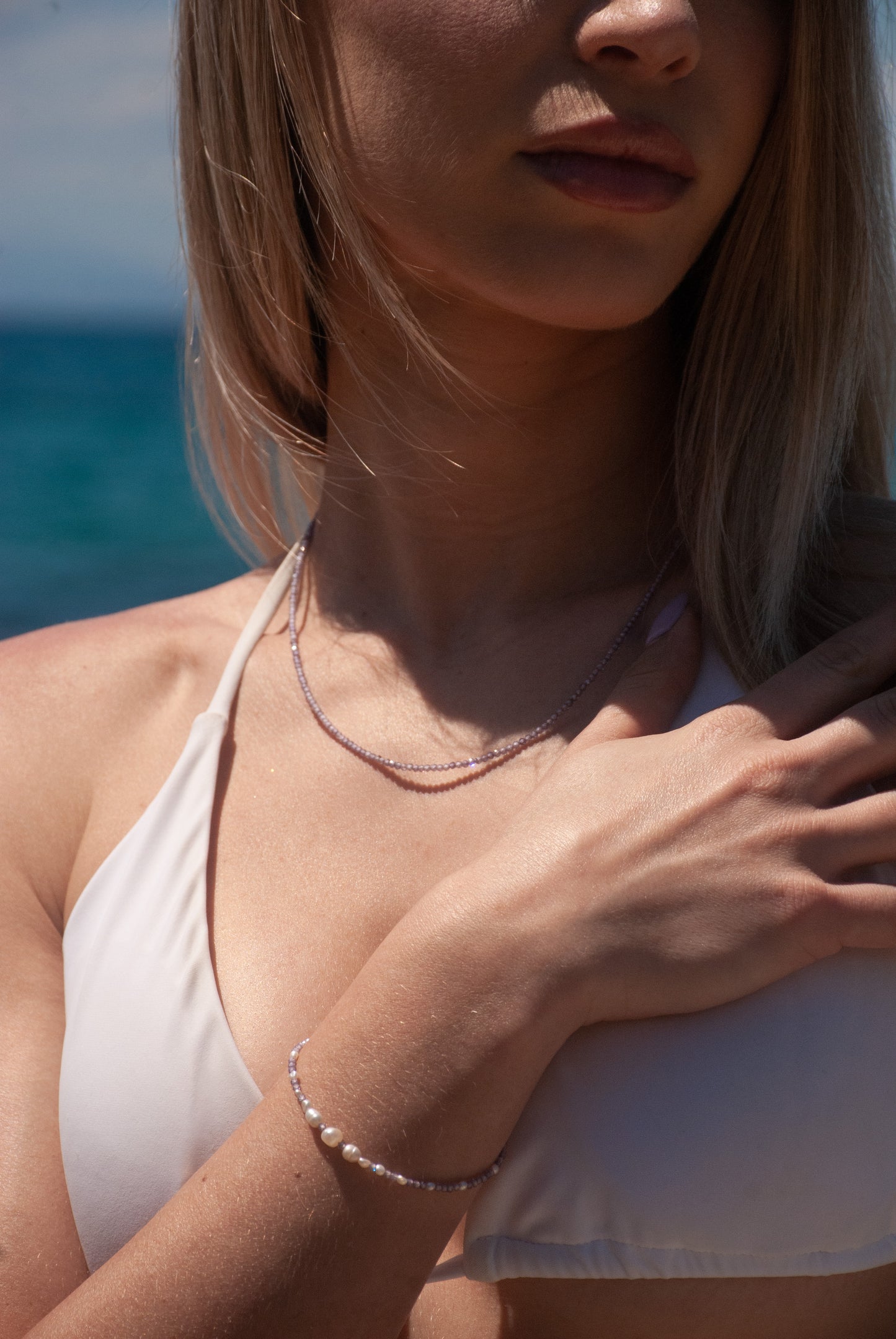 Complete the Look with the "Iris" Necklace & Bracelet set.